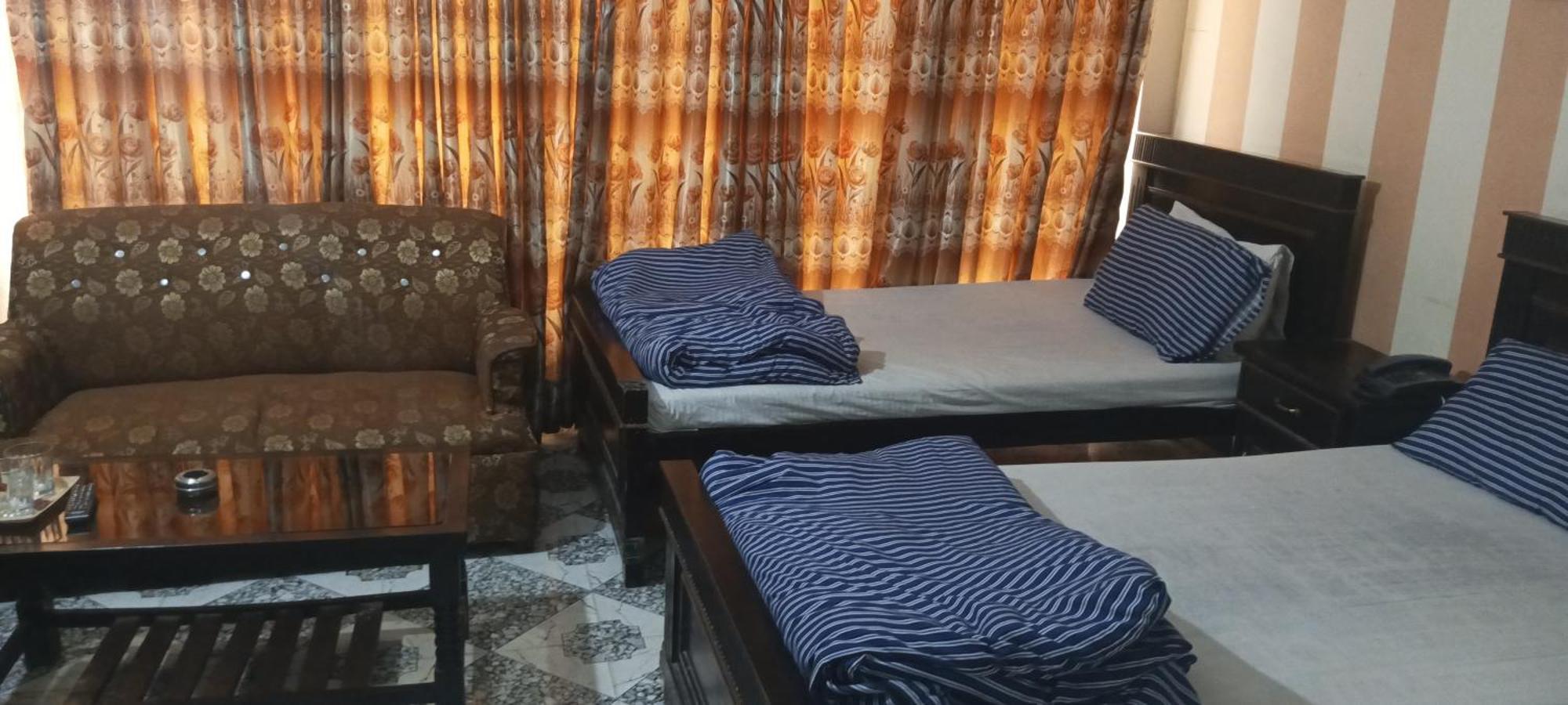 Hotel De Grand Rawalpindi Quarto foto